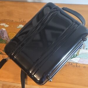 Sleek Black Zero Halliburton Briefcase Style Purse